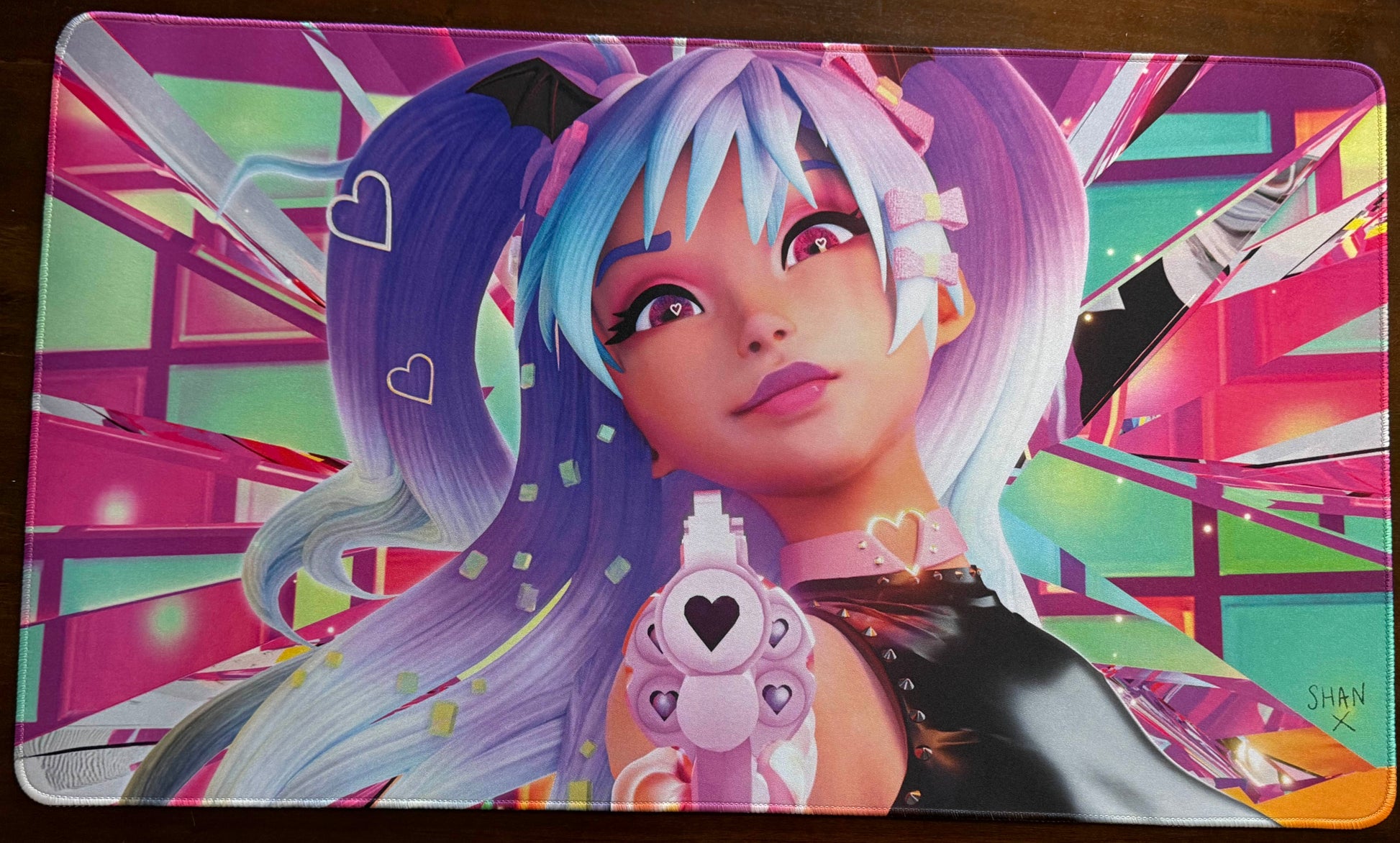 Bad Vibes Magic the Gathering playmat featuring colorful anime girl holding heart motif blaster on neon geometric background